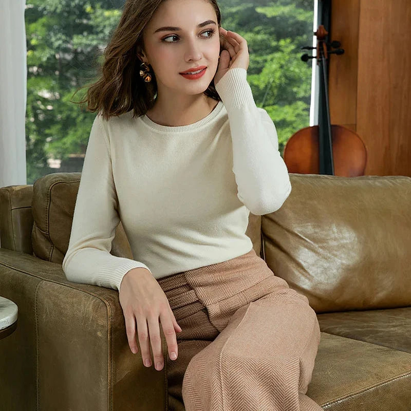 Corduroy pants and cream sweater with snakeskin boots